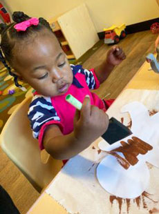 210 Toddlers Making Gingerbread People Paint