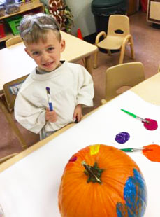 06 Reese Painting Pumpkins Halloween