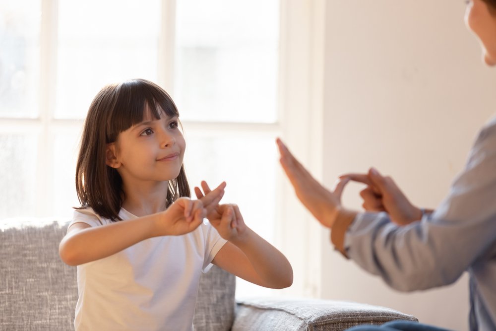 children using sign language